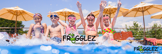Five kids in pool splashing on edge of pool