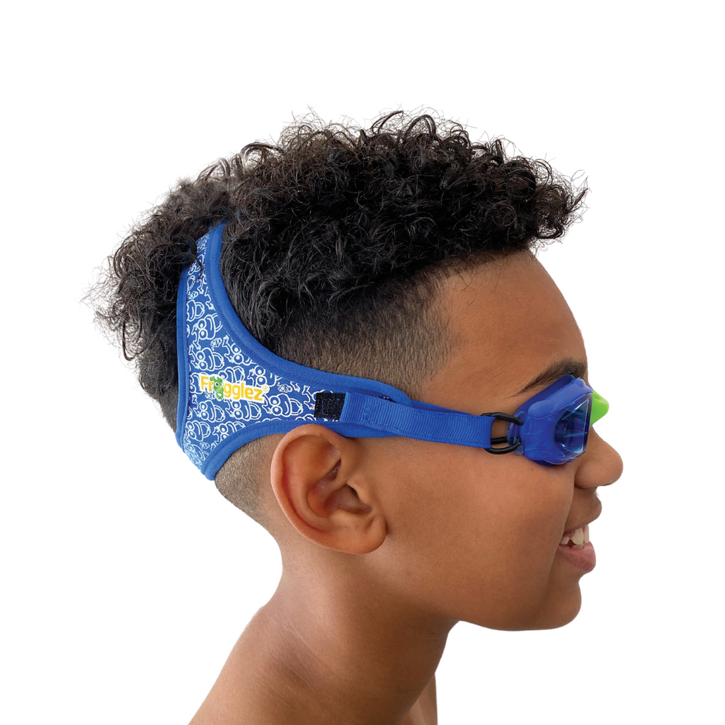Blue Frogz repeating  patterned swimming goggles on white background