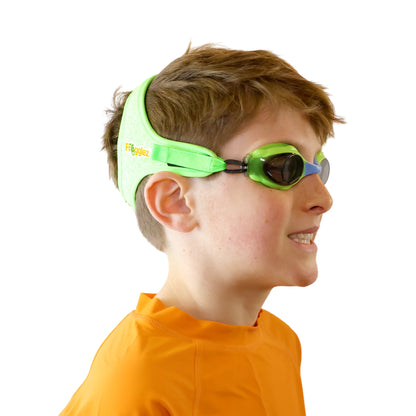 boy wearing green frogz frogglez swimming goggles