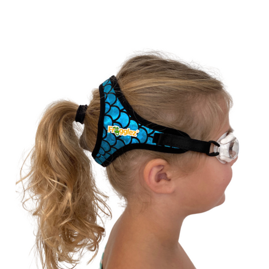 Blue Sharkz pattern patterned swimming goggles on white background