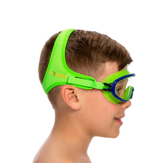 Solid Green patterned swimming mask on white background