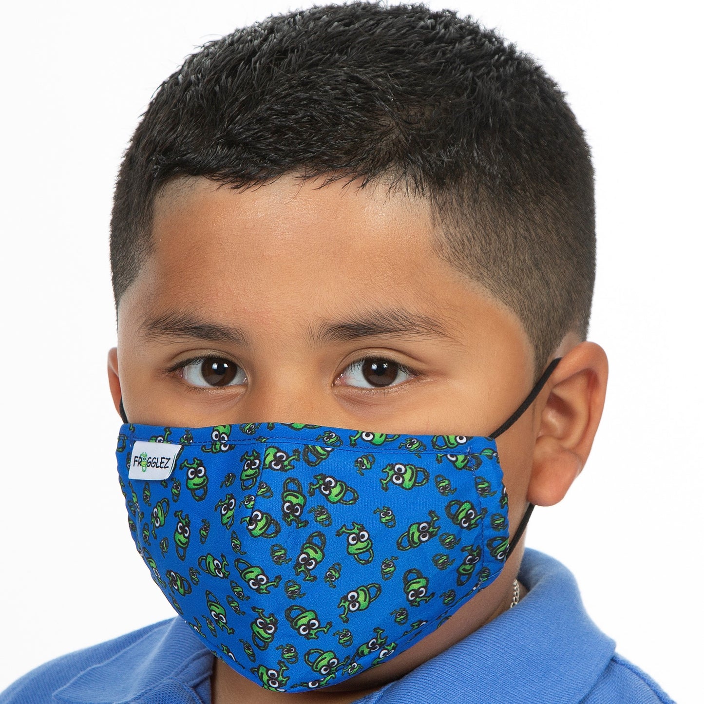 Boy wearing blue cloth face mask with frog print